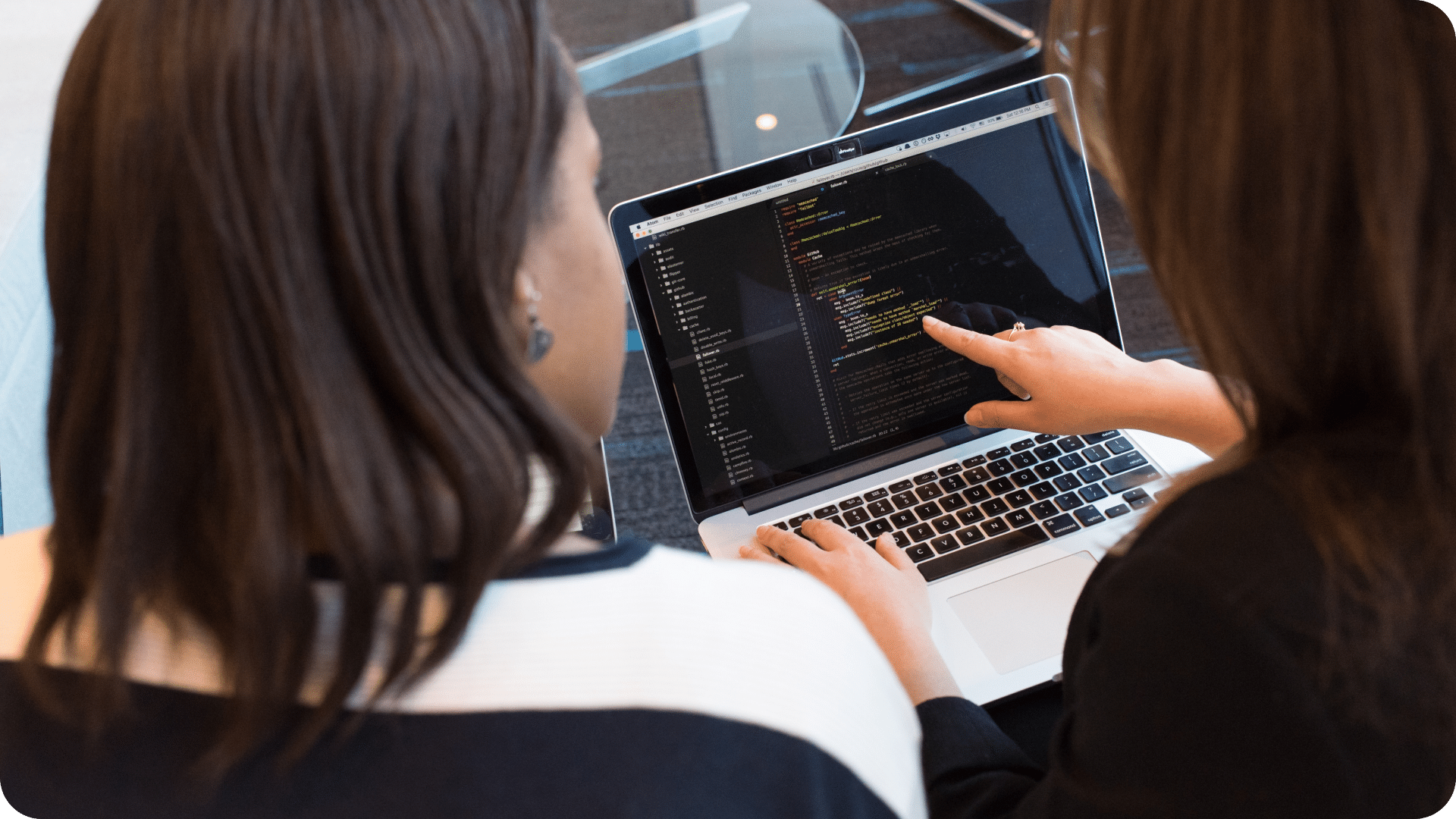 One person describing computer code to another person