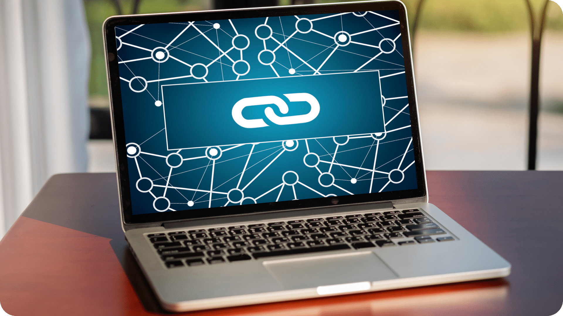 A Chain-link diagram on a laptop which represents backlinks.
