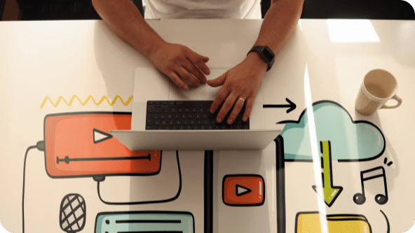 A person sitting at a laptop creating content strategy