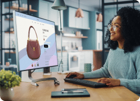 Business owner looks at merchandise on their eCommerce website.