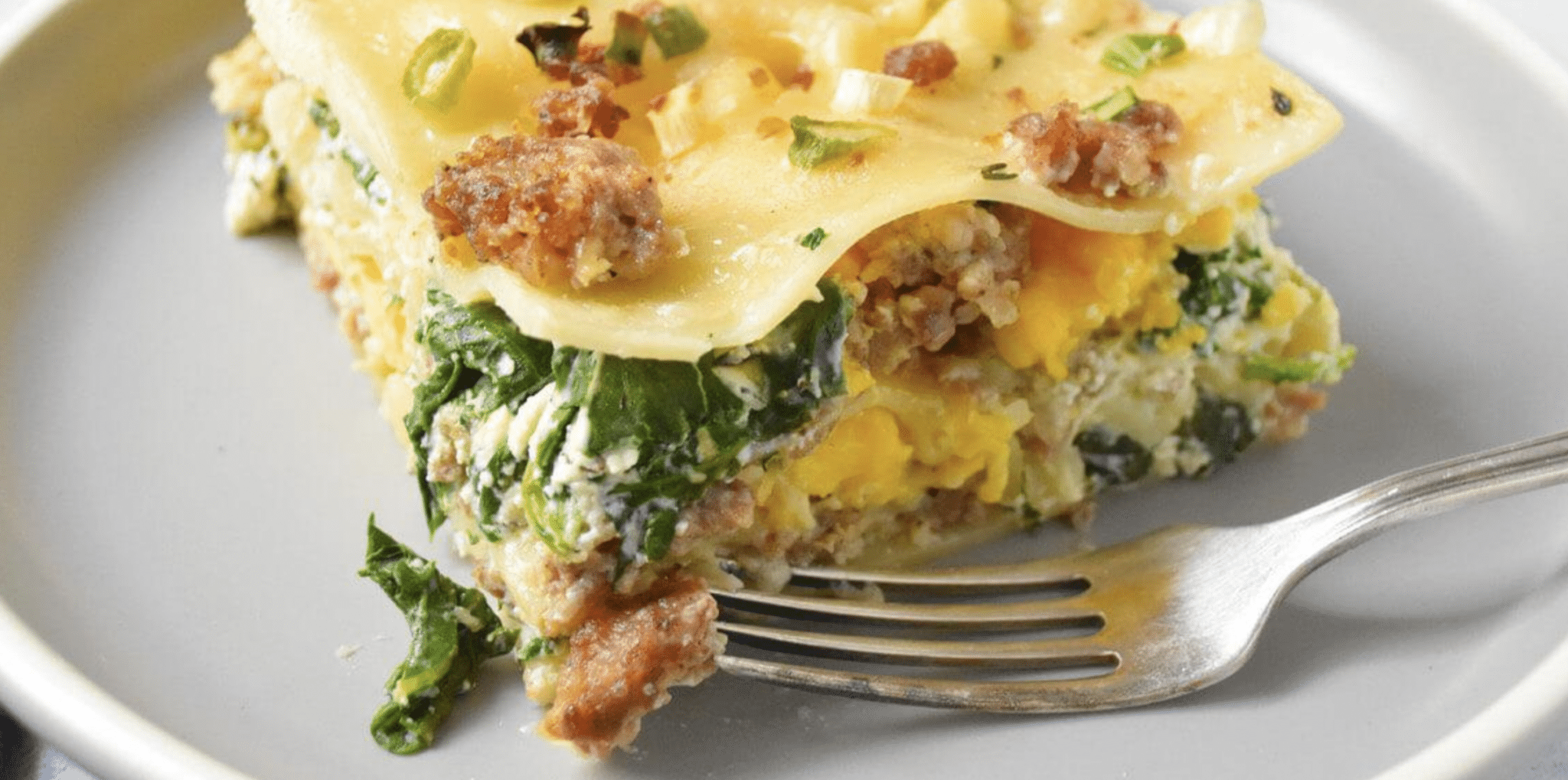 Swaggerty's Sausage lasagna with noodle's, spinach, cheese, and sauce.