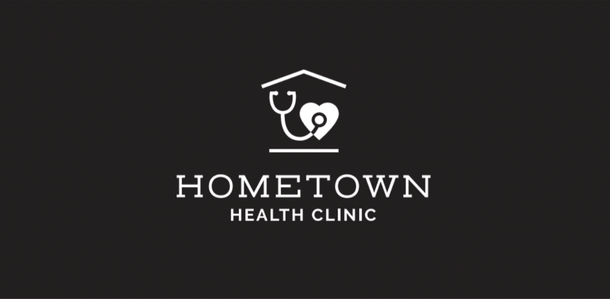 Hometown Health Clinic in white font on an ash grey background and a white hut with a heart and stethoscope