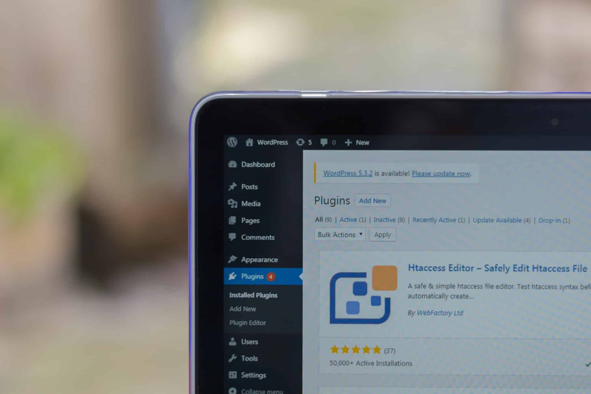 WordPress plugins dashboard with corner view and Htaccess Editor.