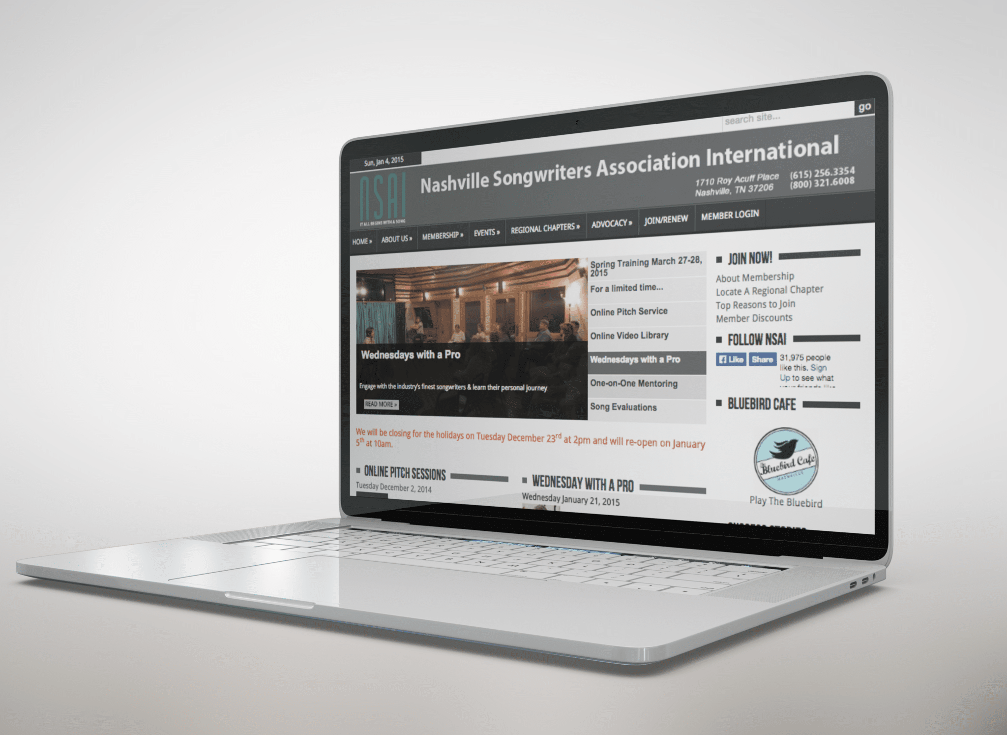 Nashville Songwriters Association International website homepage on an open laptop with white background.