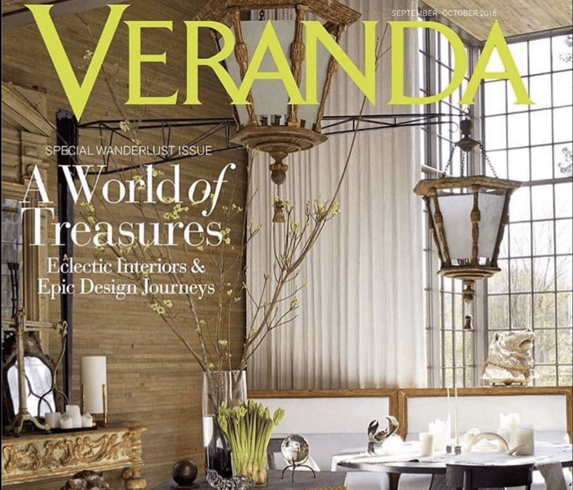 Magazine VERANDA cover picture with antique chandeliers and classy furniture with decoration pieces showing a mention of Revival Homes