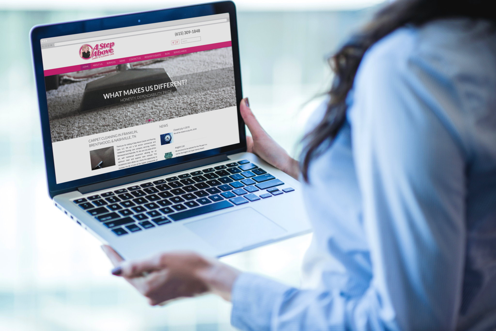 User searches through the A Step Above Floor and Carpet Cleaning website on a laptop.