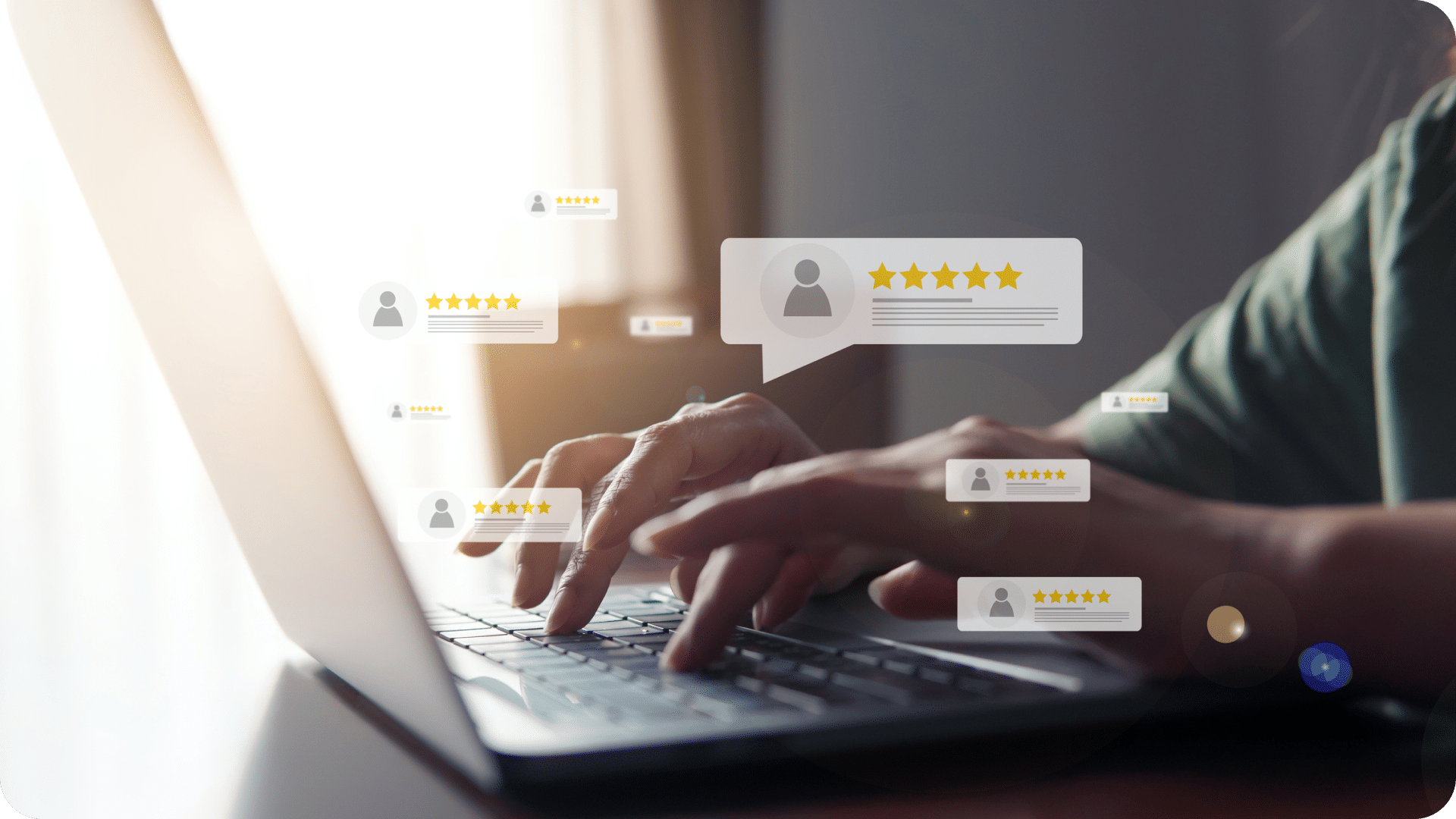 Person sits at their laptop with holographic website review icons popping out of screen.