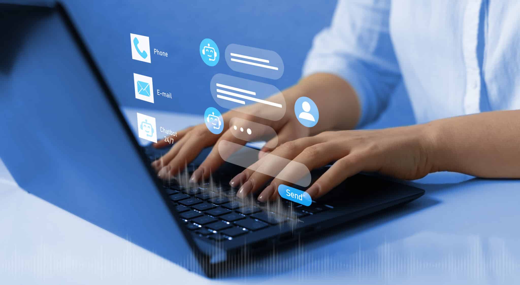 Laptop with student sitting at keys, holographic chat icons pop-up representing student chats.
