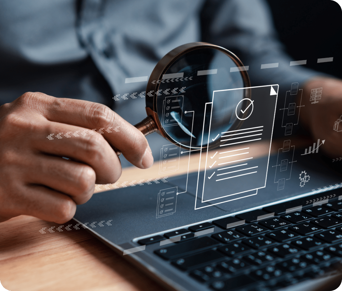 Laptop with magnifying glass being held to holographic checklist document.