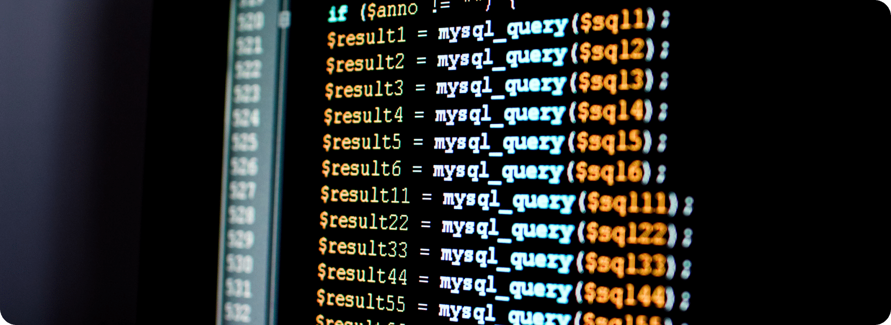 Lines of website code across a monitor being analyzed for accuracy.