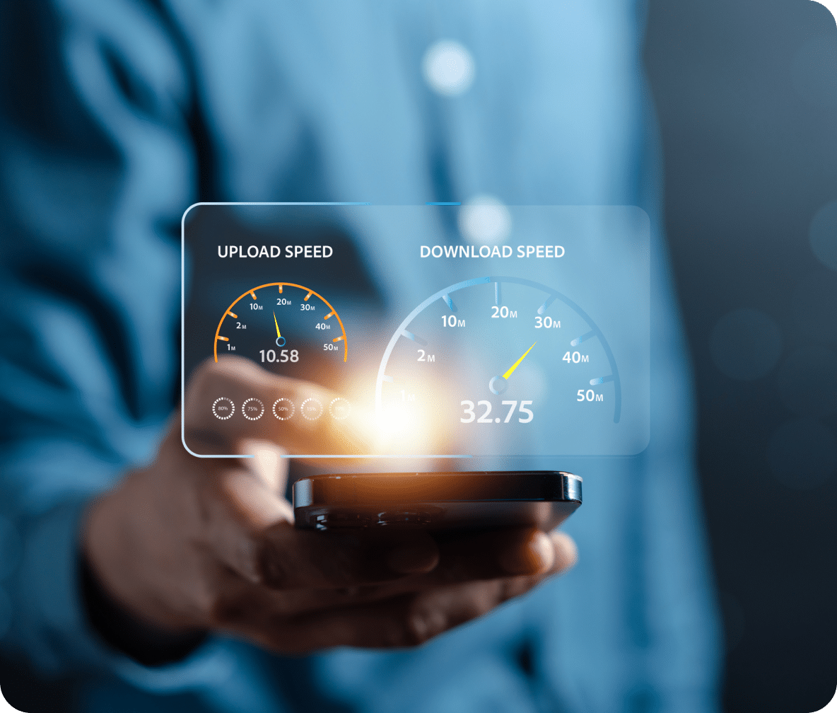 Mobile phone held out in a hand with a holographic image of upload and download speed gauges.