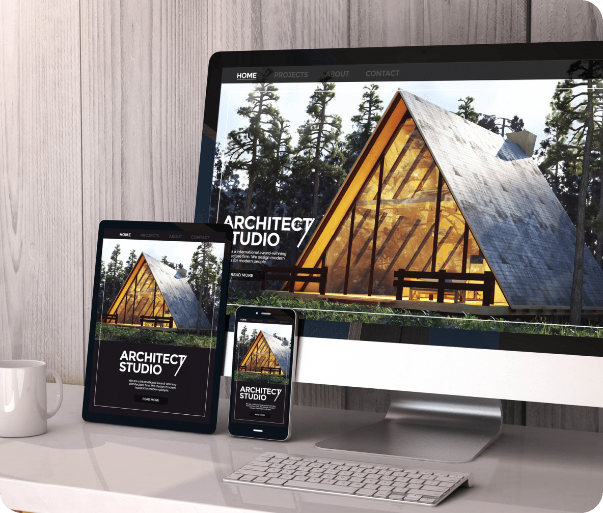 Large monitor, tablet, and mobile phone display an architecture website home page.