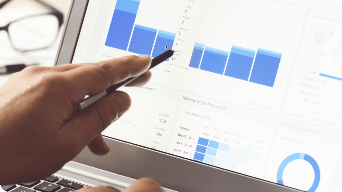 Stylus touches a screen as data is reviewed for a website.