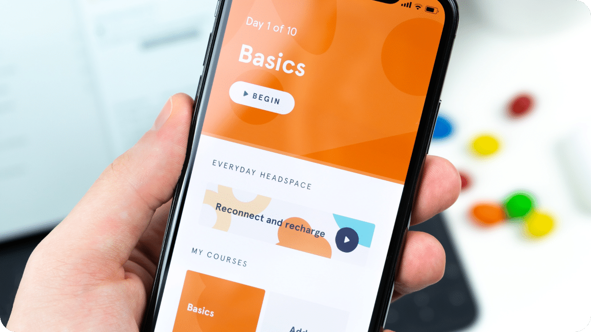App with orange background, and interactive buttons for a game-like experience.