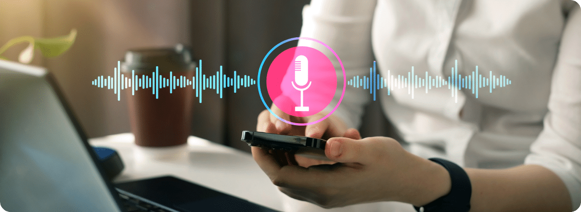 Person holds a mobile phone with a pink speaker icon and voice frequency lines over the image.