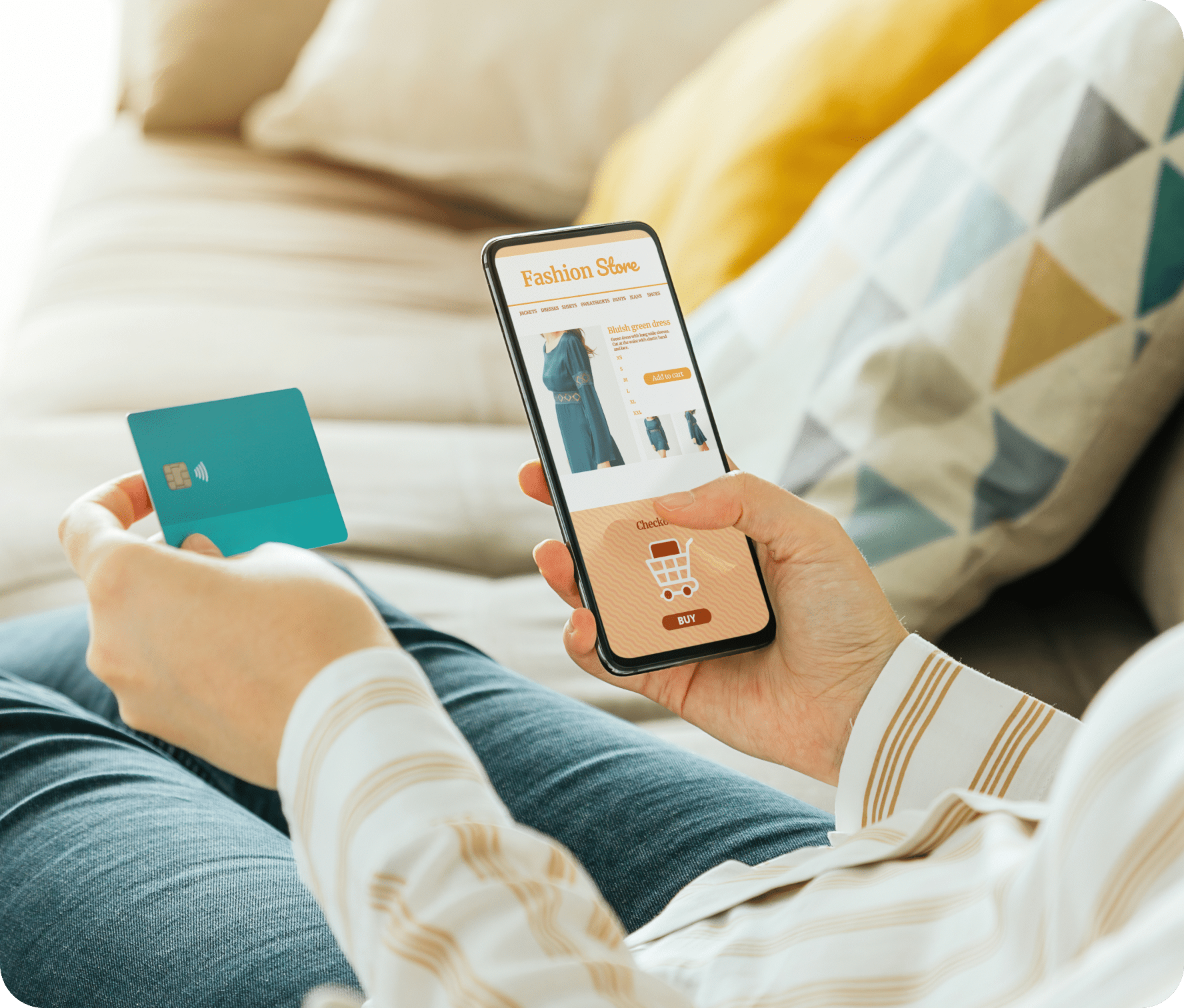 Person holds their cellphone and credit card in other hand as they process an eCommerce order.