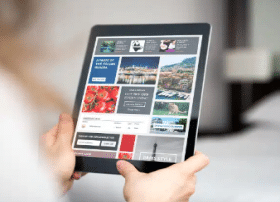 Display ads on an iPad as a user scrolls through them
